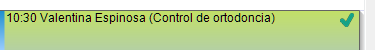 Una cita de la agenda con un tilde verde a la derecha.
